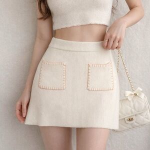 Anthropologie Jacquie The label rib knit mini skirt with pink stitching